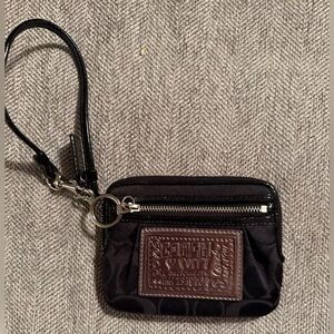 Coach Poppy Black Wristlet with Dark Silver Patch